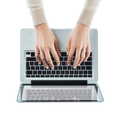 Fototapeta na wymiar Blogger typing on a laptop