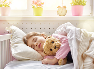 girl sleeping in the bed