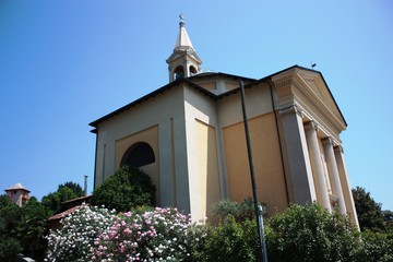 Church of San Rocco in Solcio Lesa under blue sky, Italy