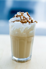 Summer cocktails with ice cream on wooden table