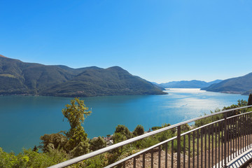Panoramic of Lake Maggiore, part of Italian Switzerland. A very bland sunny day in pina estat with an intense blue lake