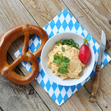 Fresh german Pretzel with Obatzda cheese