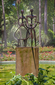 CORDOBA, SPAIN - MAY 28, 2015: The monern fountain "Agricultor, Agricultura, y Progreso" Jose Carrilero (1964) in Jardines de la Agricultura.