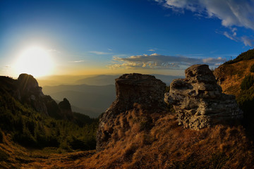 mountain landscape at sunset in Ceahlau, Romania