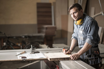 Man in private carpentry workshop