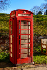 WYMESWOLD, ENGLAND - JANUARY 15: A rural British red traditional telephone box. In Wymeswold, England on 15th January 2016.