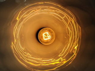 Light bulb illuminated and taken from above