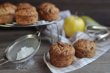 Fototapeta na wymiar Freshly baked muffins with pear and apple