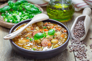 Homemade soup with lentils and sausages