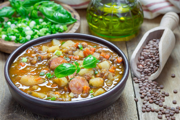 Homemade soup with lentils and sausages