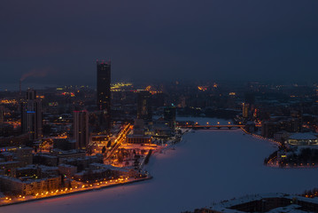 Fototapeta premium Cityscape at night, seen from the aerial view 