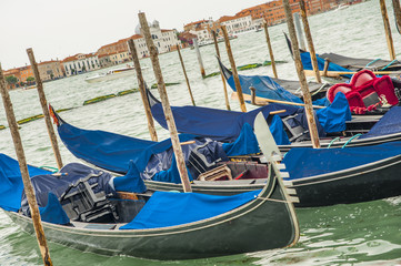 Venice gondola parked by the land