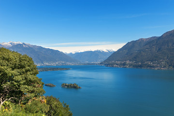 Fototapeta na wymiar Panoramic of Lake Maggiore. Beautiful summer landscape of Switzerland
