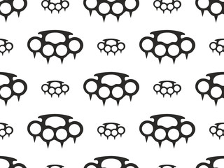 brass knuckles spikes seamless pattern