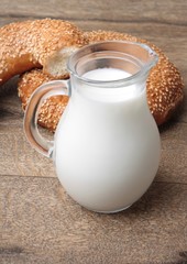 bagel with sesame seeds and milk