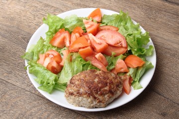 Fried cutlet meatballs with salad