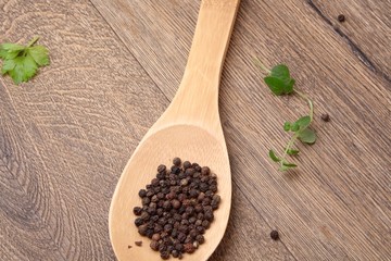  baguette with meat cutlets with onion and a spoon with pepper