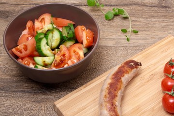 Grilled sausages and vegetables