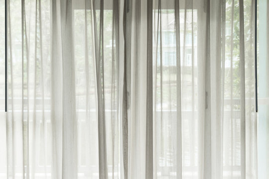 White See Through Window Curtain In A Home