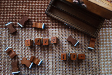 wooden box and the word 