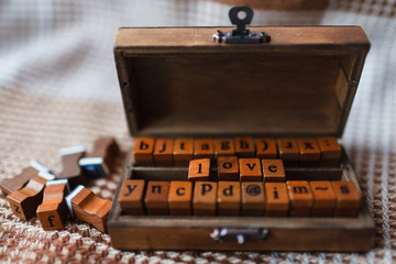 wooden box and the word 