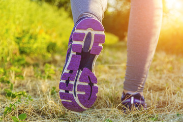 Woman running in a field