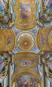 ROME, ITALY - MARCH 25, 2015: The ceiling of baroque church Basilica dei Santi Ambrogio e Carlo al Corso.