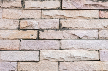 Closeup old stone brick wall texture background