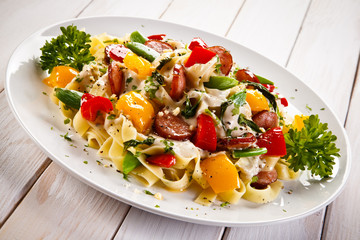 Pasta with sausages and vegetables 