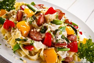 Pasta with sausages and vegetables 