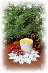 Obraz na płótnie Canvas Lighted candle and Christmas tree.