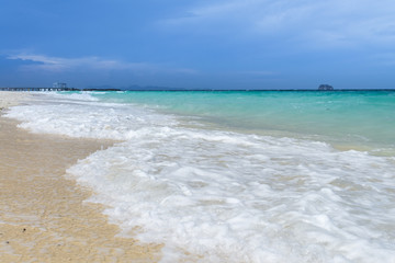 Fototapeta na wymiar Sponge water waves on beach, thailand