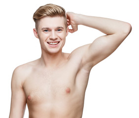 Obraz premium Handsome young man sniffing his armpit