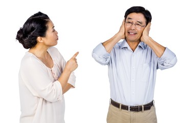 Older asian couple having an argument