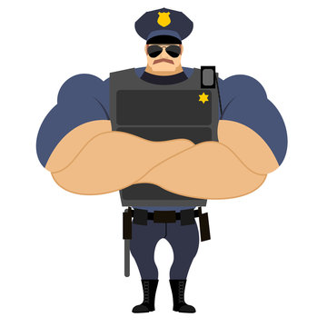 Police in flak vest. Powerful policeman in police uniform. Serva