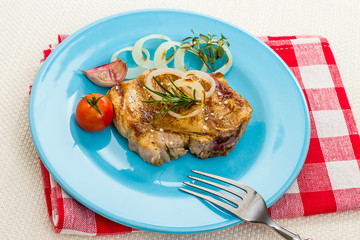 Juicy grilled pork chop, top view