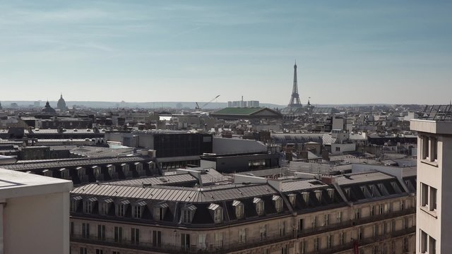 Roof top view Paris Eiffel Tower - 1080p. The famous roofs of Paris with the Eiffel Tower - Full HD