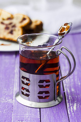 Delicious cake with fresh cherries and cup of tea