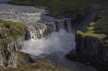 Obraz premium View on canyon of river and waterfall Hafragilsfoss in Iceland,