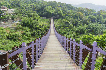 Fototapeta na wymiar The famous Baishihu Suspension Bridge