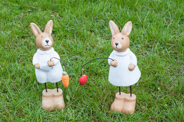 Two Easter bunny on a meadow