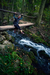 Female tourist in the forest