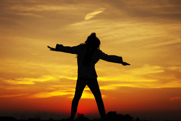 Fototapeta premium Girl at sunset