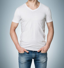 Obraz premium Man with hands in jeans pockets
