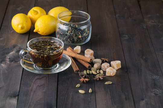 Cup of herbal tea, spices and lemon