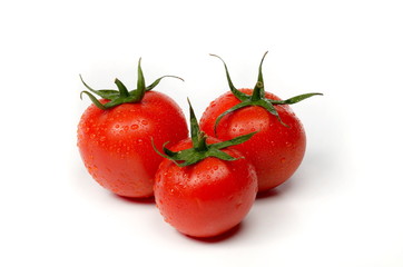 fresh tomatoes isolated on white background