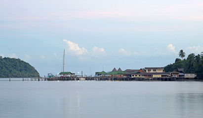 Fototapeta na wymiar fishery village along the tropical sea beach island