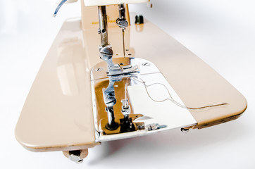 electric cream sewing machine, close up
