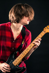 Model Red Flannel Shirt Playing Electric Guitar