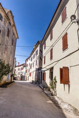 Fototapeta na wymiar Narrow Old Street Of Village Of Bale - Croatia